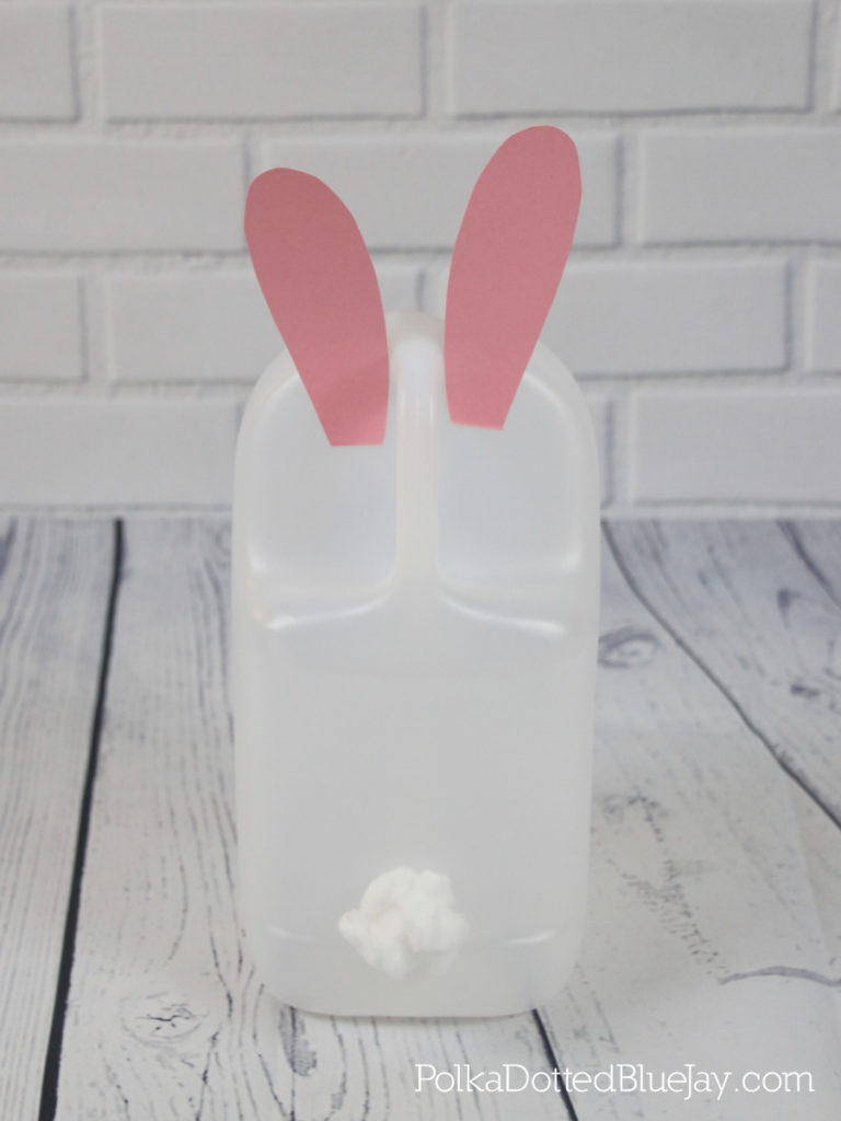 How to create an upcycled Easter Bunny Jug Basket from a milk or water jug. Click through to see the whole DIY
