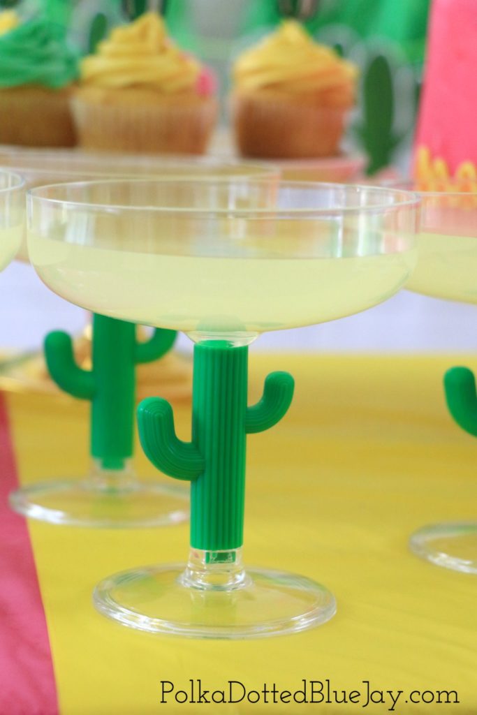 This fun and festive Cinco de Mayo Party tablescape is full of pink, yellow, and green decorations. Click through to see the whole party and a list of what you will need to throw your own Cinco de Mayo fiesta!