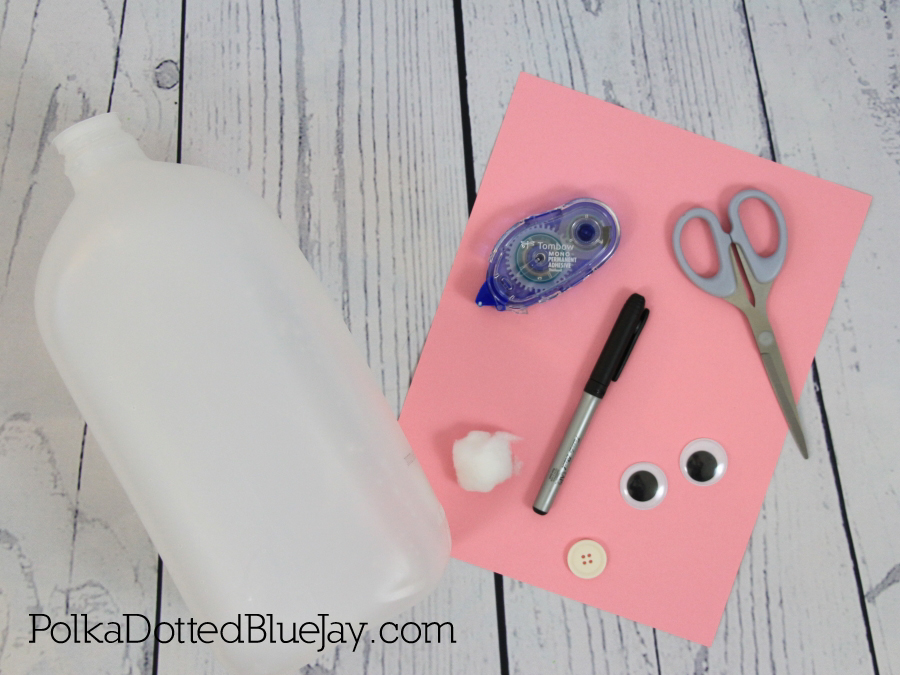 How to create an upcycled Easter Bunny Jug Basket from a milk or water jug. Click through to see the whole DIY