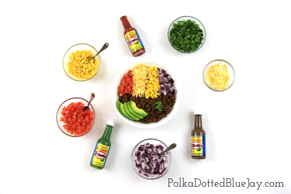 Make your meal easy and delicious to take on the go with this colorful taco salad bowl and El Yucateco® Hot Sauce #KingofFlavor #FlavorRocksTG