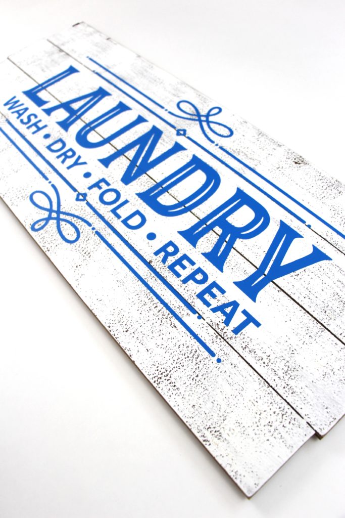 Add a little charm to your laundry room with this DIY Farmhouse Laundry Room Sign. Click here to see how easy it is to make. 