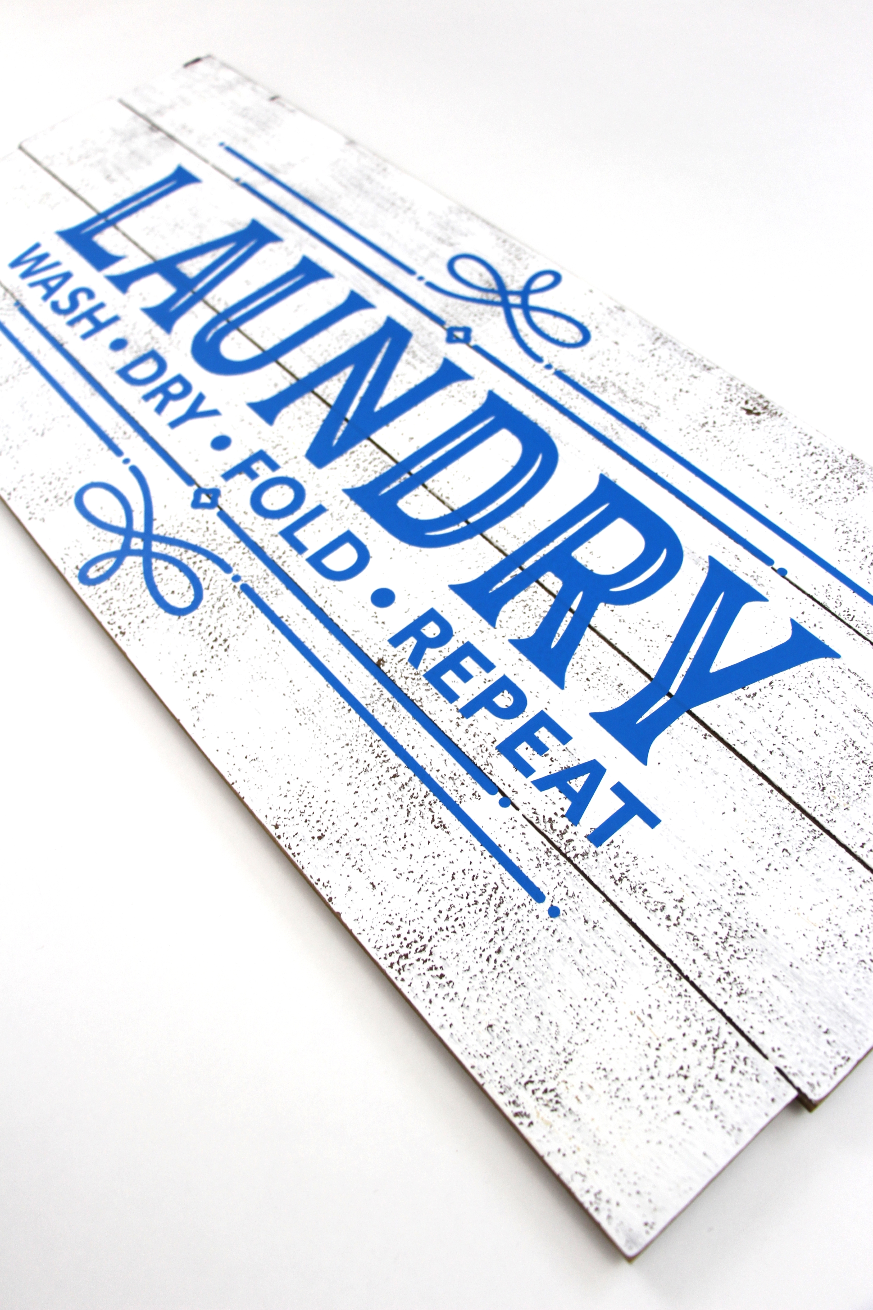 Add a little charm to your laundry room with this DIY Farmhouse Laundry Room Sign. Click here to see how easy it is to make.