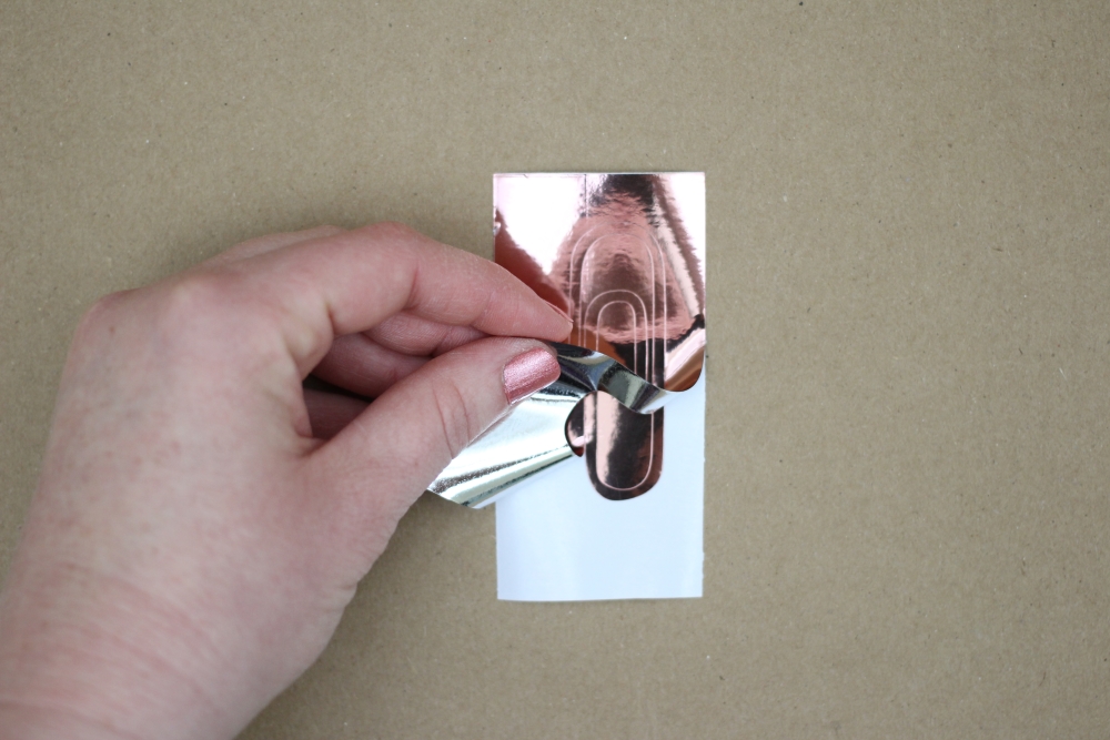 Office organization doesn't have to be dull. Click here to see how easy it is to make a DIY Rose Gold Paper Clip Bowl with this step-by-step tutorial.