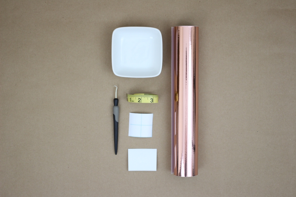 Office organization doesn't have to be dull. Click here to see how easy it is to make a DIY Rose Gold Paper Clip Bowl with this step-by-step tutorial.