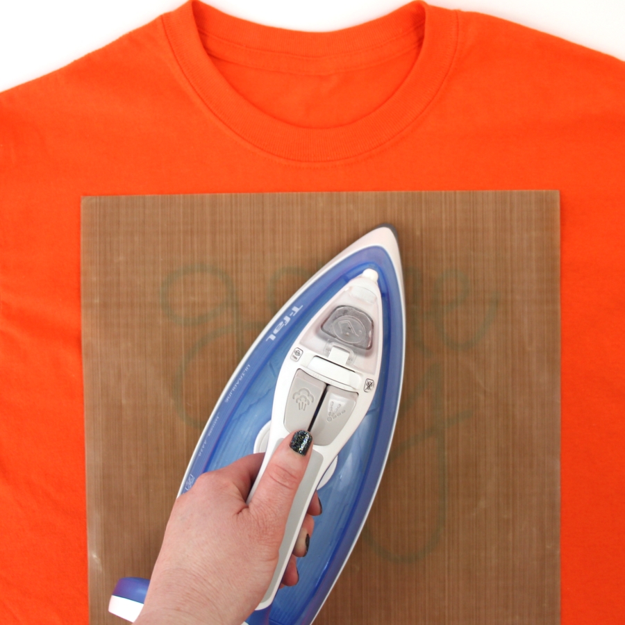 Click here to see this step-by-step tutorial to how to make this Glitter Heat Transfer Vinyl March Madness Adult T-shirt