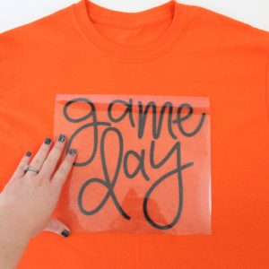 this step-by-step tutorial to how to make this Glitter Heat Transfer Vinyl March Madness Adult T-shirt