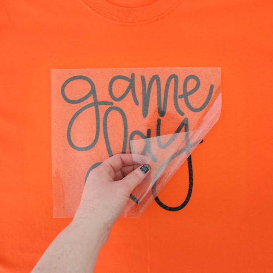 Click here to see this step-by-step tutorial to how to make this Glitter Heat Transfer Vinyl March Madness Adult T-shirt