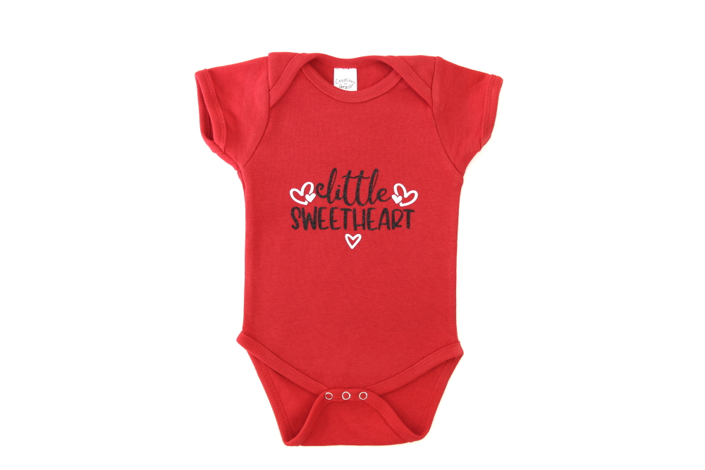 A step-y-step tutorial for how to make a Valentine's Day "Little Sweetheart" Onesie for a baby. Click here to see more.