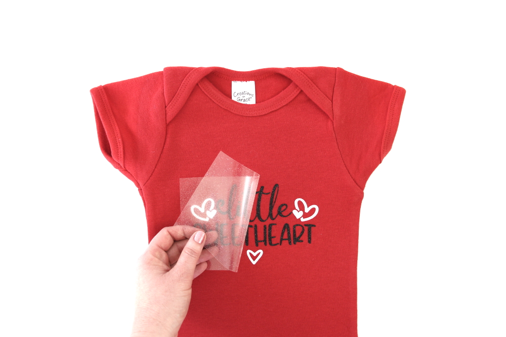 A step-y-step tutorial for how to make a Valentine's Day "Little Sweetheart" Onesie for a baby. Click here to see more. 