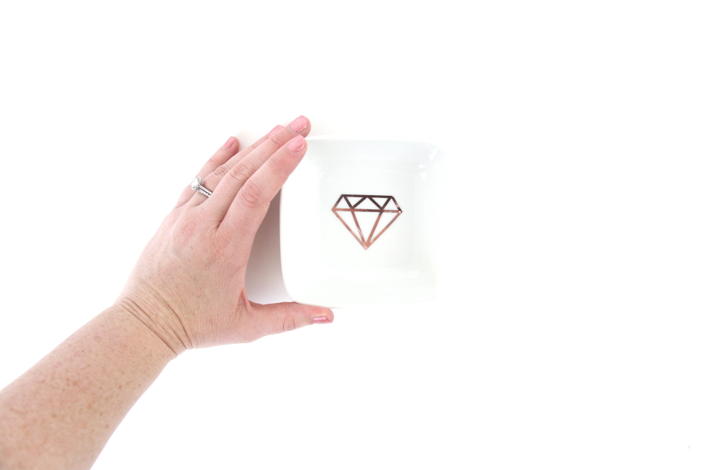 Make a rose gold diamond dish with adhesive vinyl. The perfect bridal shower gift. Click here to see the tutorial from Polka Dotted Blue Jay.