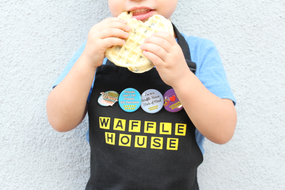 Make a DIY Waffle House Costume with yellow heat transfer vinyl and a blank apron. Click here to see the supply list and the whole tutorial.