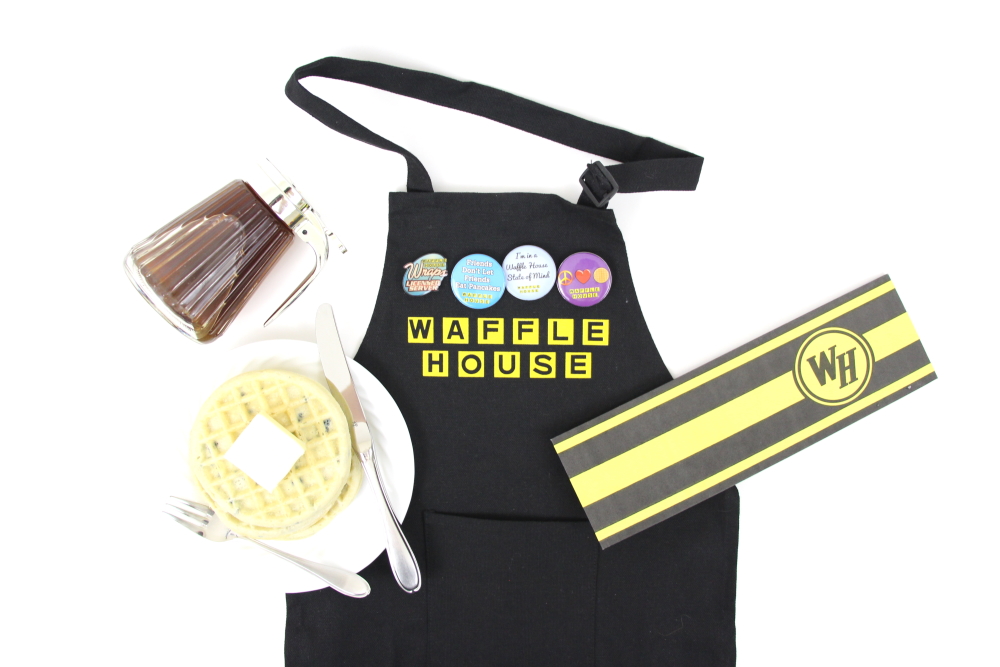 Make a DIY Waffle House Costume with yellow heat transfer vinyl and a blank apron. Click here to see the supply list and the whole tutorial.