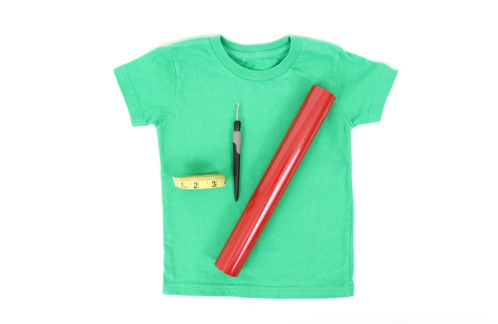 The supplies you will need to make an Is It Christmas t-shirt with Heat Transfer Vinyl