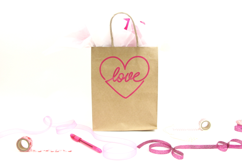 I love having paper gift bags that I can dress up last minute for a gift . This DIY Valentine's Day Gift Wrap Bag shows you just how easy it is.