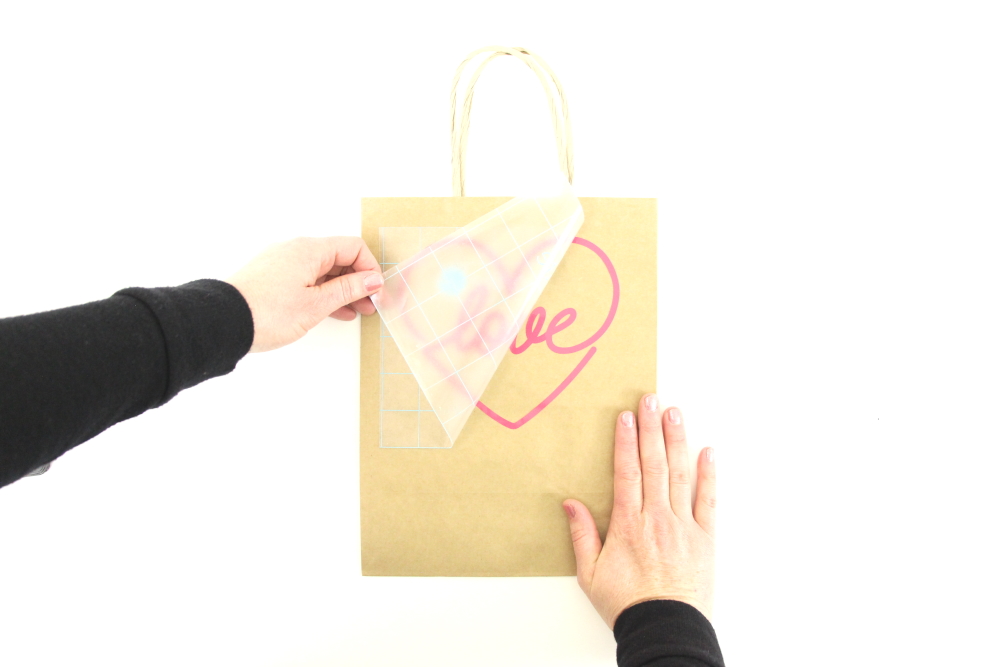 I love having paper gift bags that I can dress up last minute for a gift . This DIY Valentine's Day Gift Wrap Bag shows you just how easy it is.
