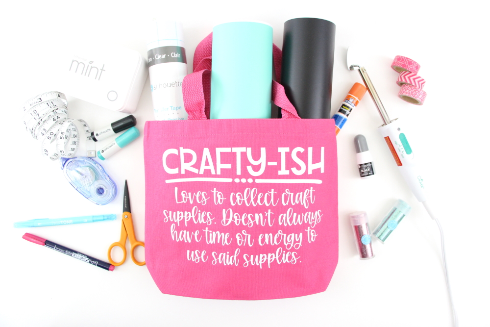 Crafty-ish: when you collect craft supplies but don't always use them. Make this DIY craft lady tote bag with heat transfer vinyl and be sure to take it with you on your next trip to the craft store!