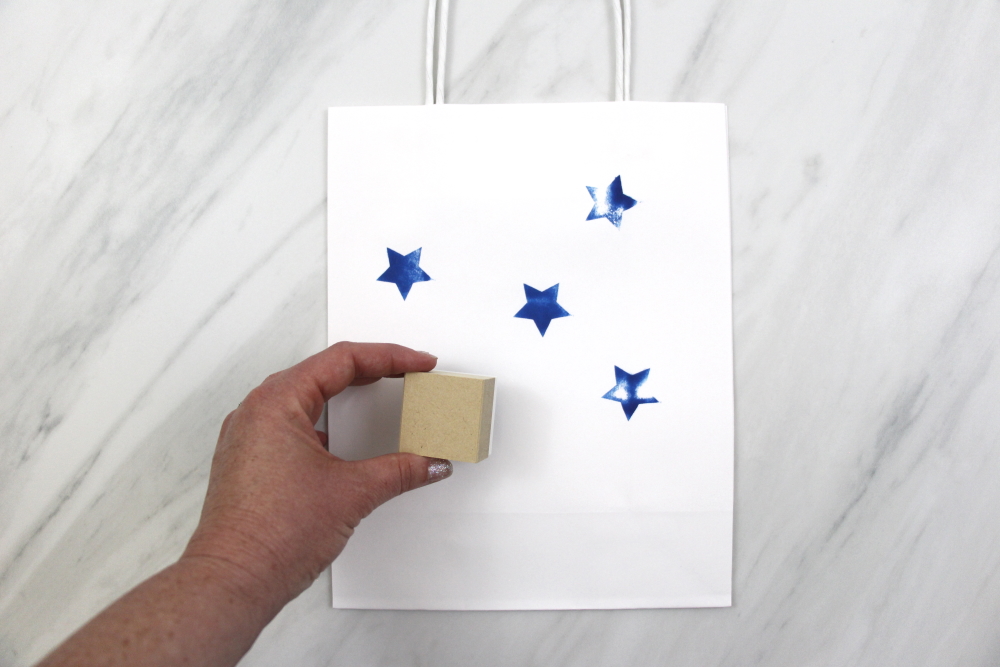 Create your own Patriotic gift wrap with Silhouette Mint™. Click here to see how to make your own star stamp.