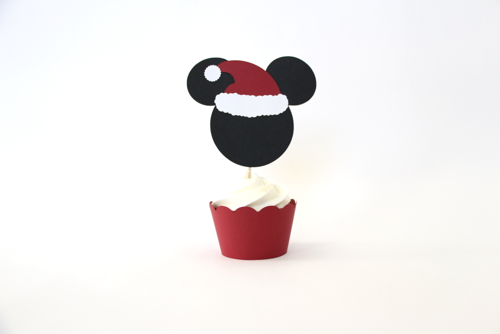 Bring some of the Disney magic home with these DIY Mickey Christmas Cupcake Toppers!