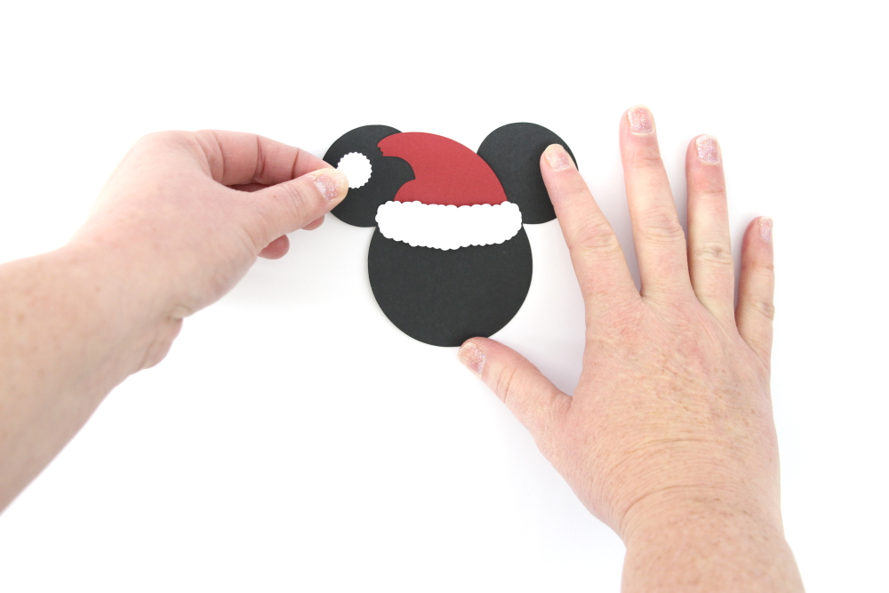 Bring some of the Disney magic home with these DIY Mickey Christmas Cupcake Toppers!