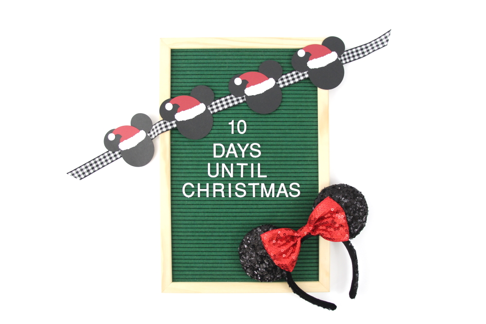 Make this easy Mickey Mouse Christmas Banner with some cardstock!