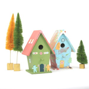 Use wood birdhouses, some paint, and these adorable print and cut designs from Amy Robison to make a DIY Christmas Village.