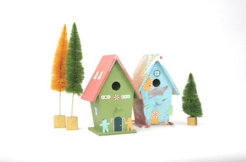Use wood birdhouses, some paint, and these adorable print and cut designs from Amy Robison to make a DIY Christmas Village.
