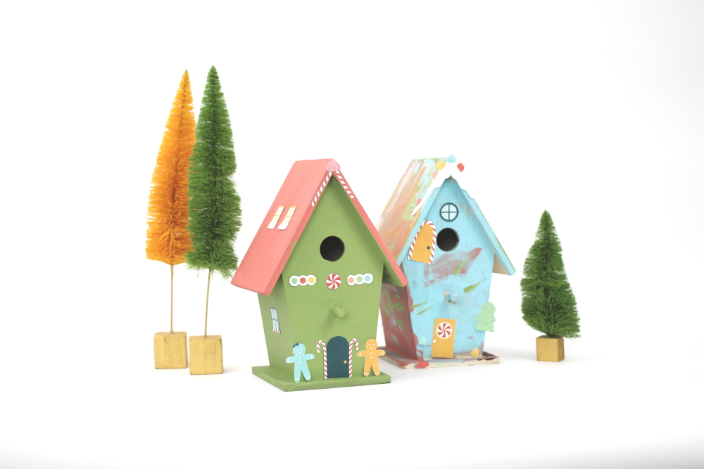 Use wood birdhouses, some paint, and these adorable print and cut designs from Amy Robison to make a DIY Christmas Village.