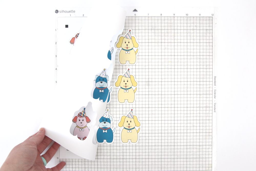 Make easy puppy party cupcakes with these print and cut designs from Amy Robison - available in the Silhouette Design Store.